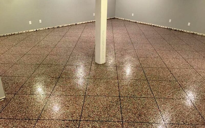 Empty room with tiled floor and column.