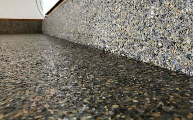 Polished terrazzo floor with speckled pattern.