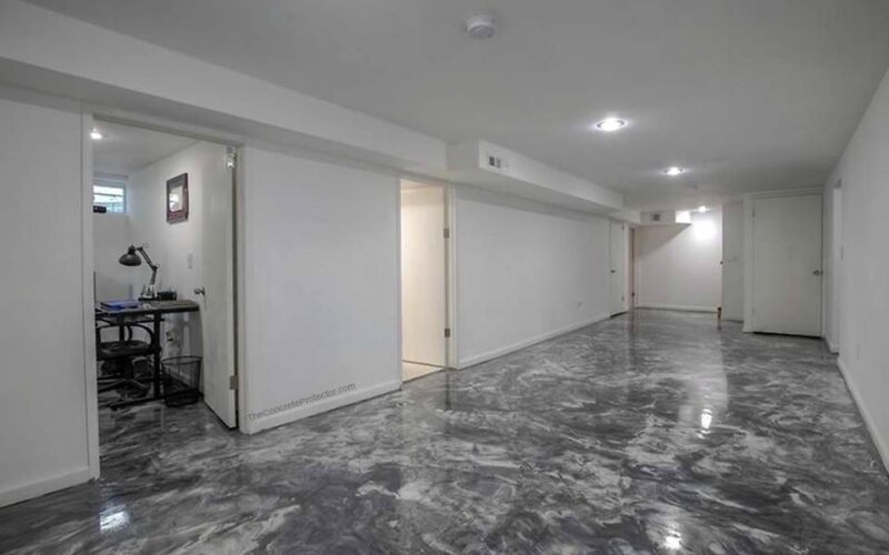 Spacious basement with polished gray marble floor.