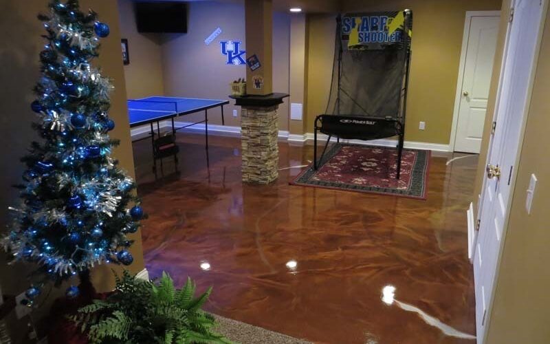 Basement game room with Christmas tree.