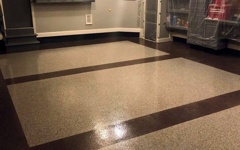 Clean garage with polished floor and shelves.